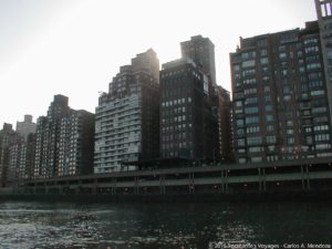 Entering the concrete canyon that is the East River...